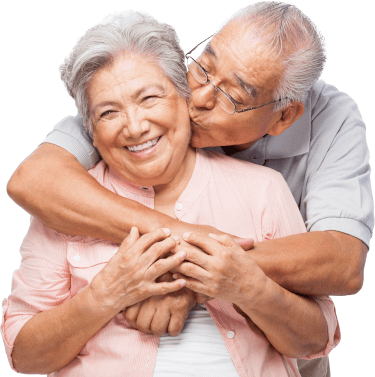 Elderly couple hugging and smiling Elderly couple hugging and smiling