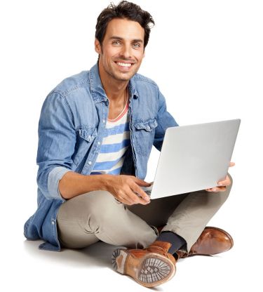 Man sitting on the floor with his laptop Man sitting on the floor with his laptop