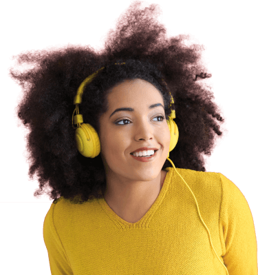 Image of a woman listening to music on her headphones Image of a woman listening to music on her headphones