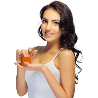 Image of a woman in her skin care routine Image of a woman in her skin care routine