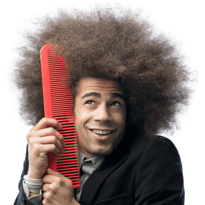 Image of a man with big curly hair and a big red comb Image of a man with big curly hair and a big red comb
